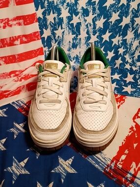 Puma Women's 7.5 White Sneakers with Green Lining and Gold Logo